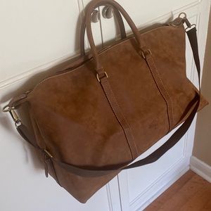 Brown leather duffle bag